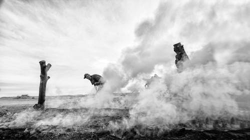 Smoke around Man in Black and White