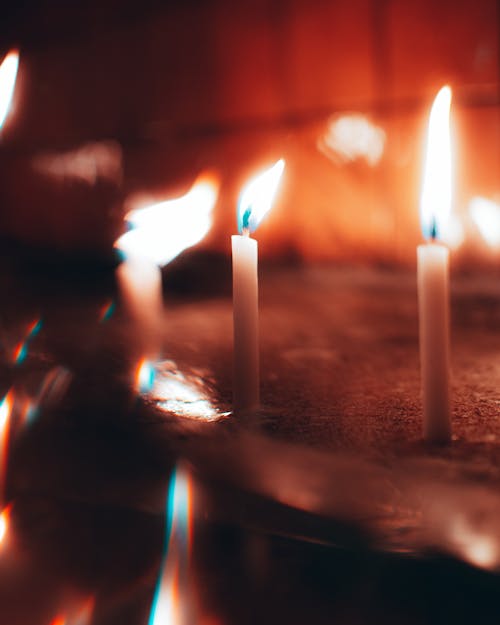 Close up of Burning Wax Candles