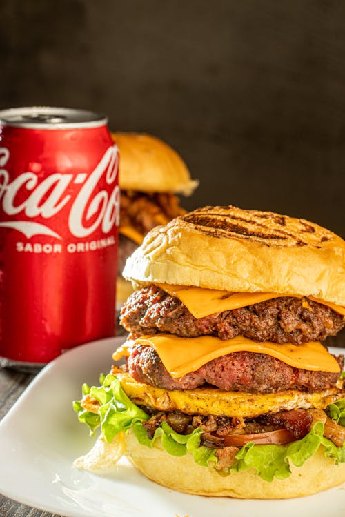 Free Coca Cola and Cheeseburger Stock Photo
