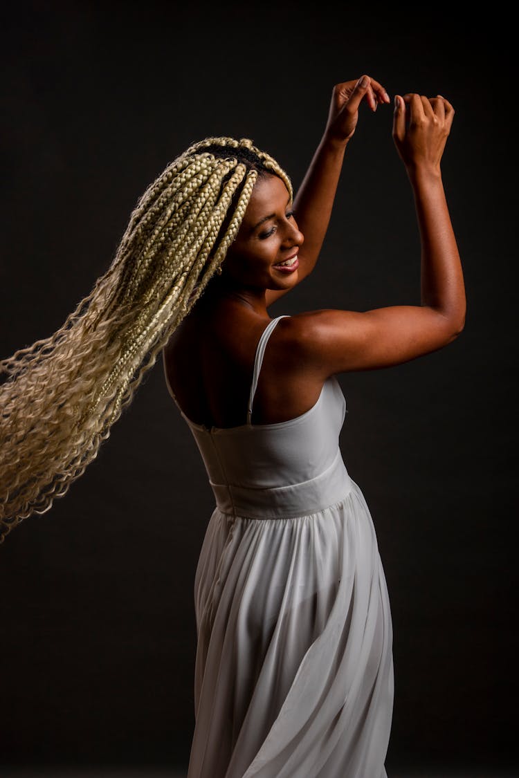 Woman Wearing Dress In Studio