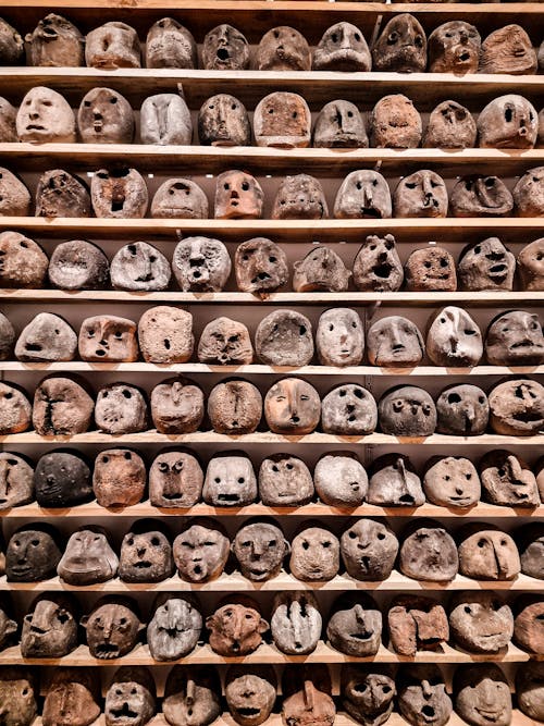 Free Carved Stones on the Shelves Stock Photo