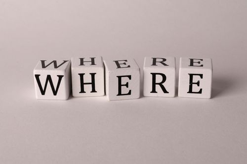 Free Close-up of white blocks with letters spelling 'WHERE' against a plain background. Stock Photo