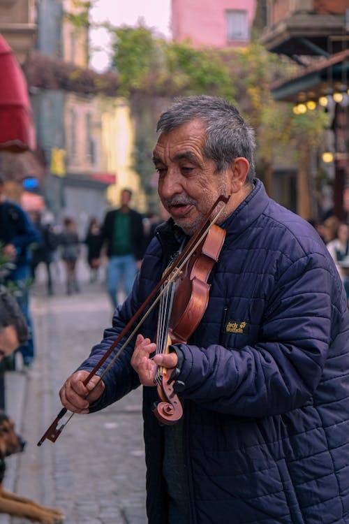 A Man Playing a Violin