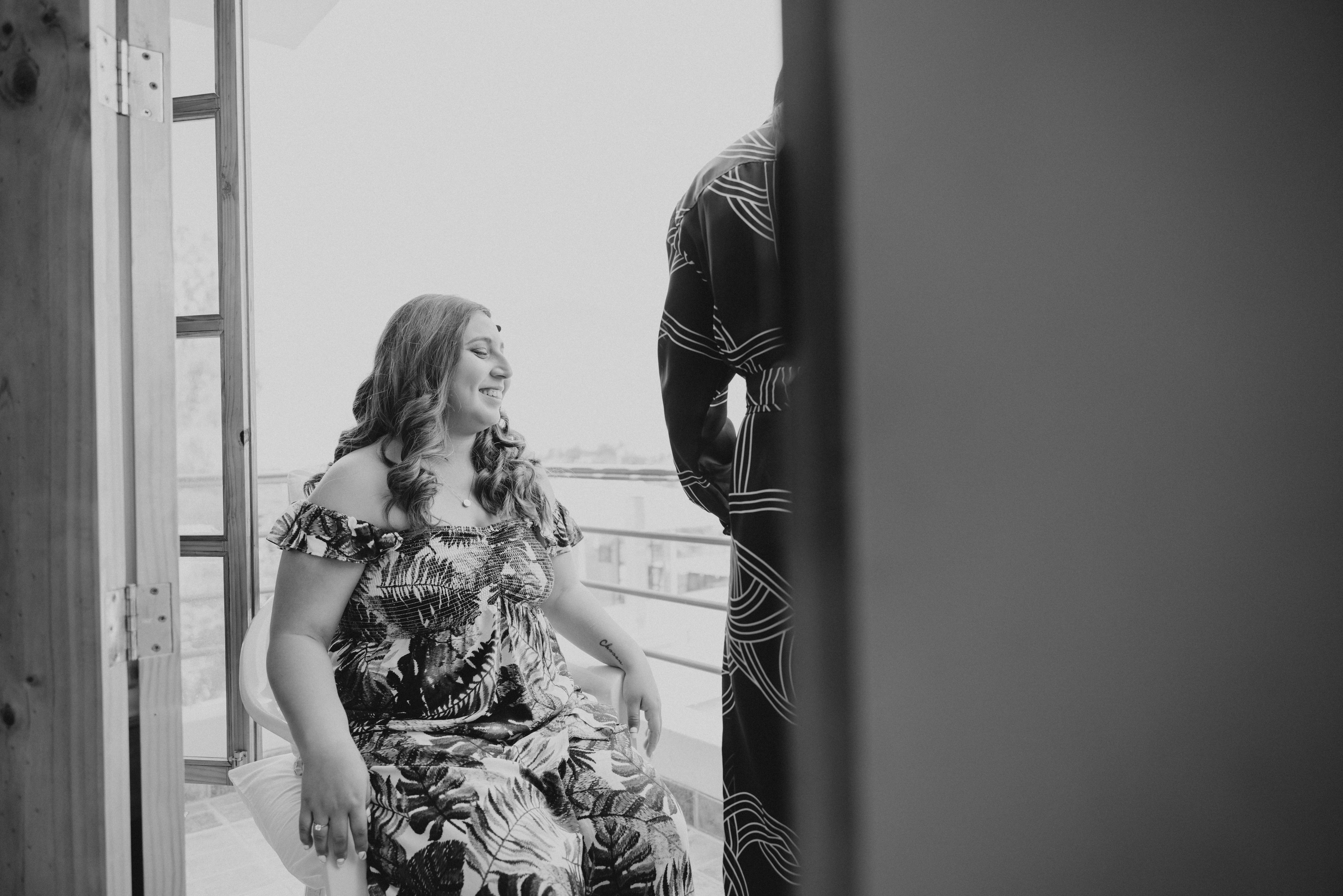 Grayscale Photo of a Woman Wearing Floral Dress · Free Stock Photo