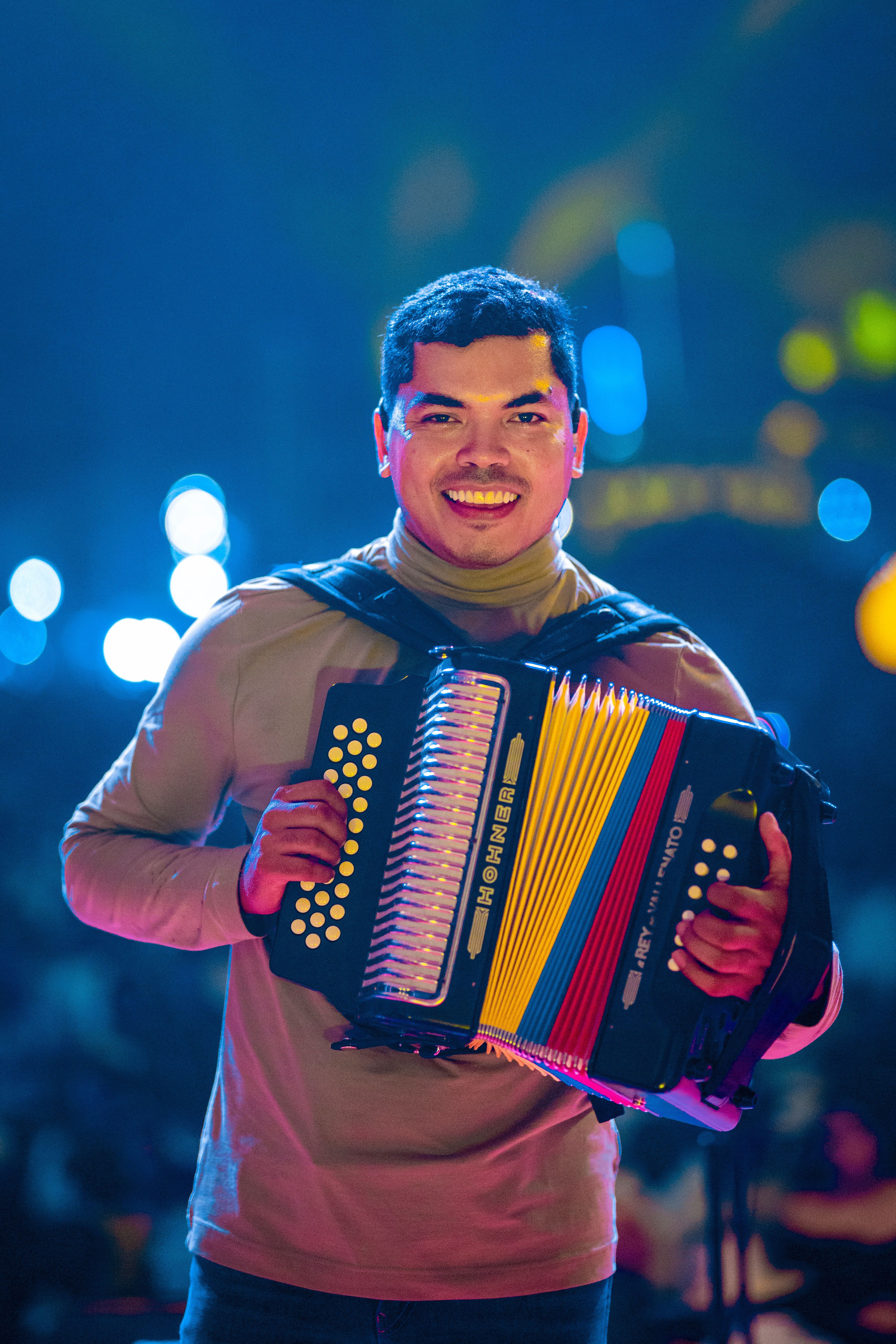 Portrait of Man Playing on Accordion at Night · Free Stock Photo