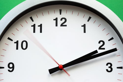 Free White Clock Reading at 2:12 Stock Photo