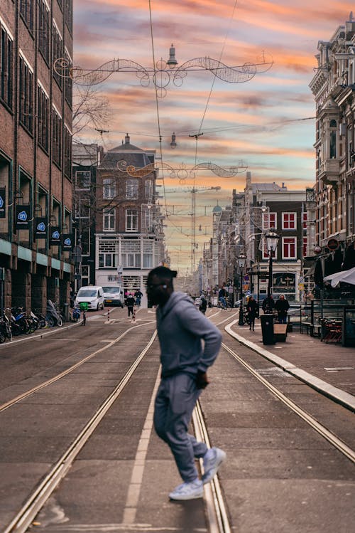 Man Crossing Street in City