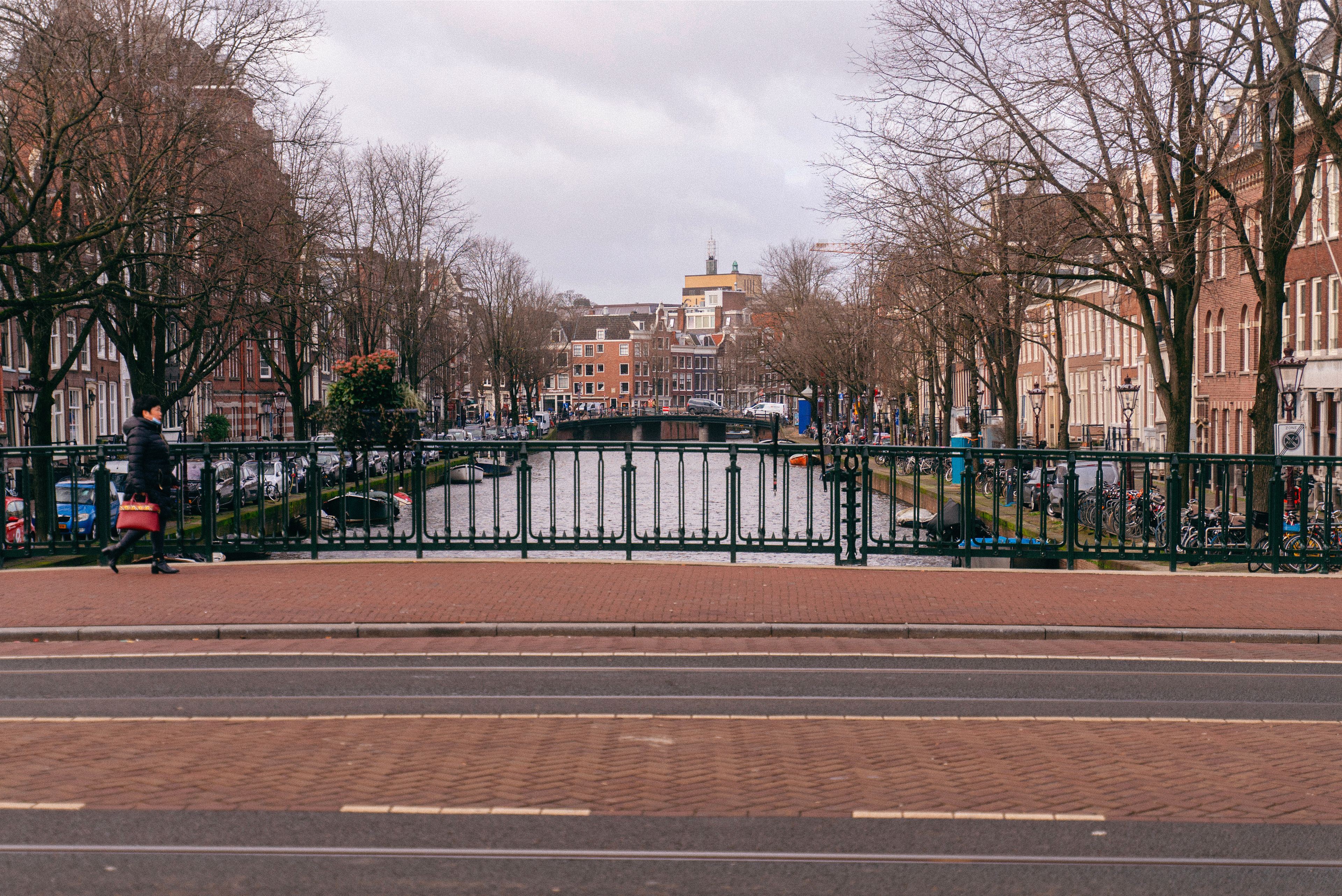Canal house facades and a bridge in Amsterdam's Nine Streets, the walkable mid-range base for a 3-day itinerary