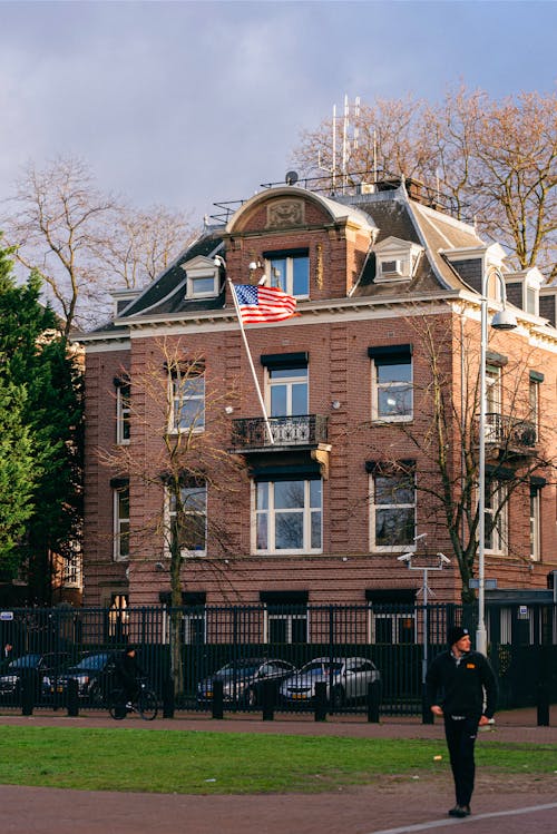 Gratis stockfoto met amerikaanse vlag, buitenkant van het gebouw, huizen