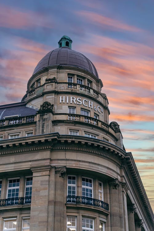 The Hirsch Building in Amsterdam Under Orange Sky