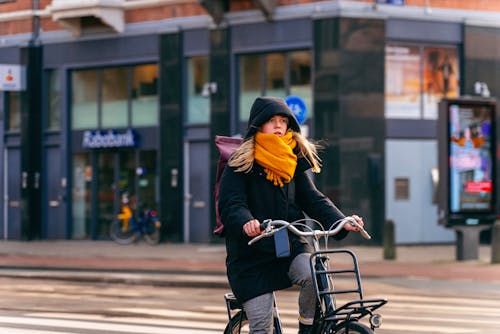 A Woman Riding a Bicycle