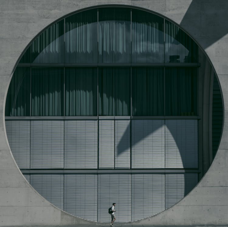 Man Walking Past The Marie-Elisabeth-Luders House