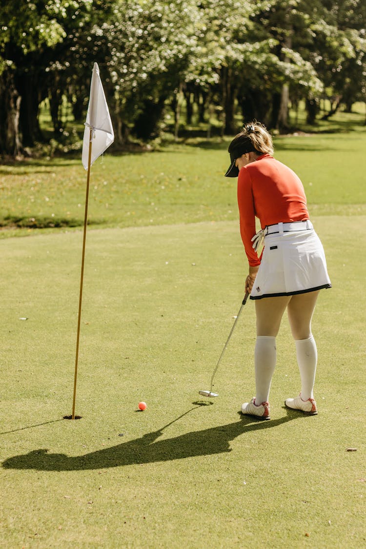 A Woman At A Golf Course 