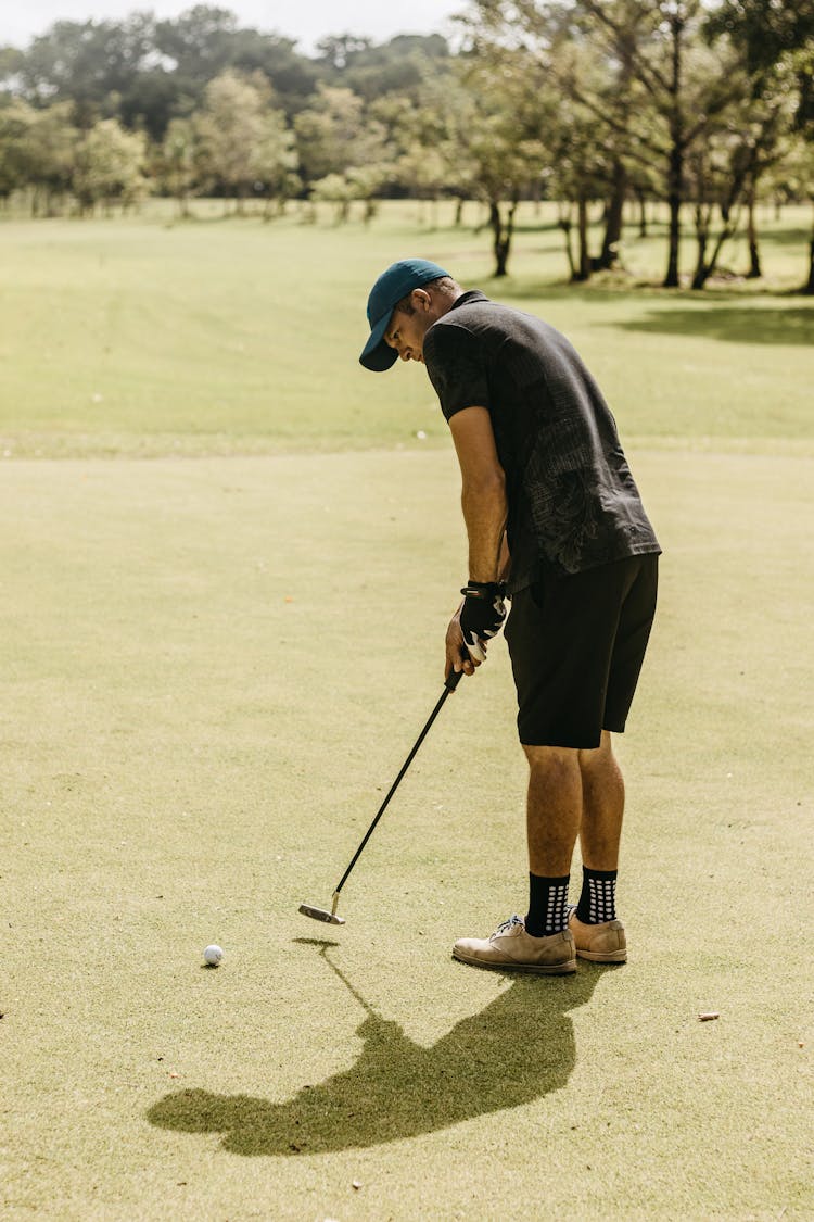 A Man Playing Golf 