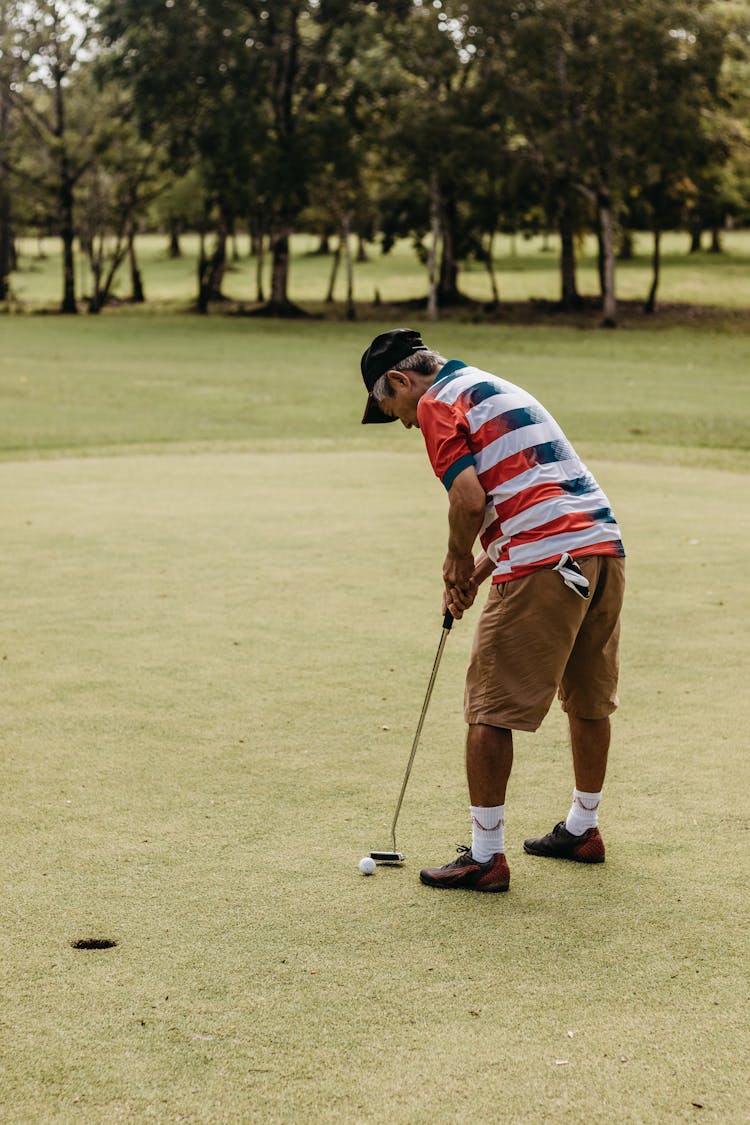 A Man Playing Golf 