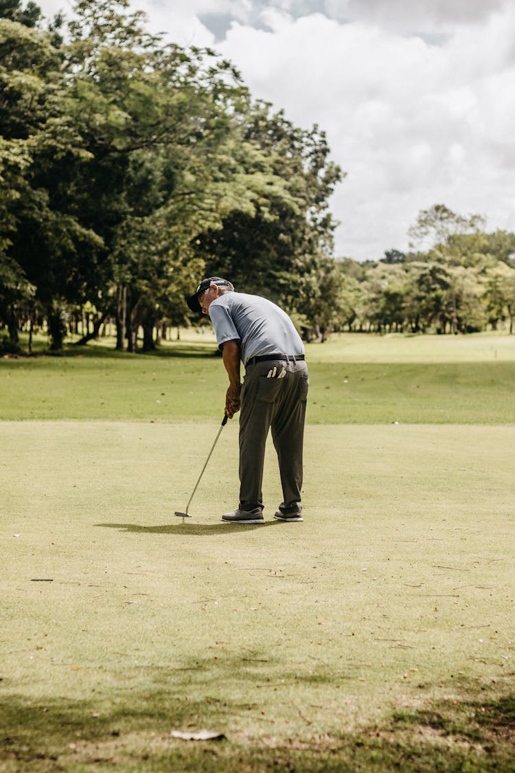 A Man At A Golf Course 