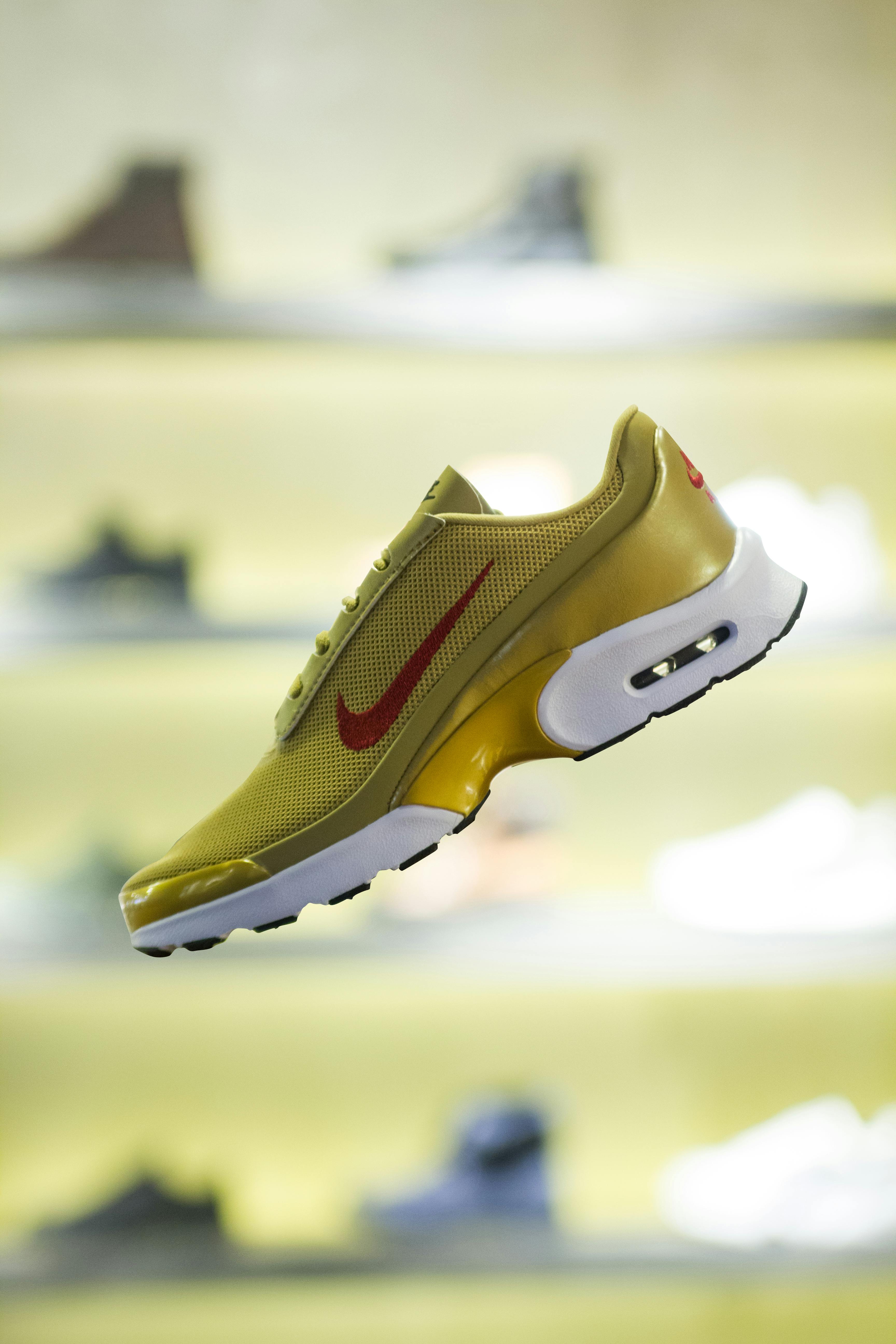 stylish yellow running shoe in modern store