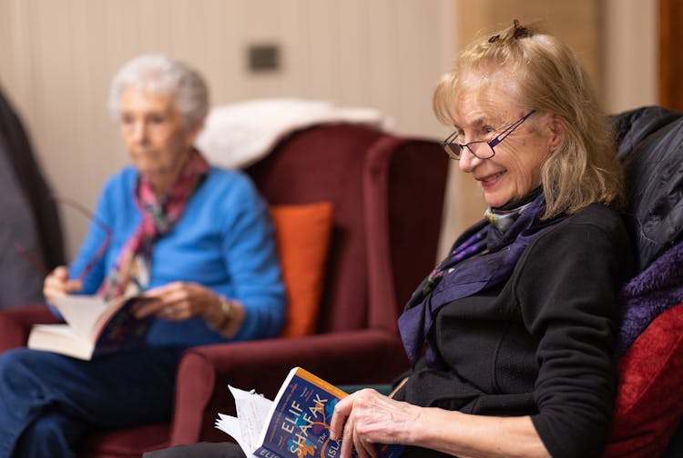 Elderly Women Spending Time In Book Club