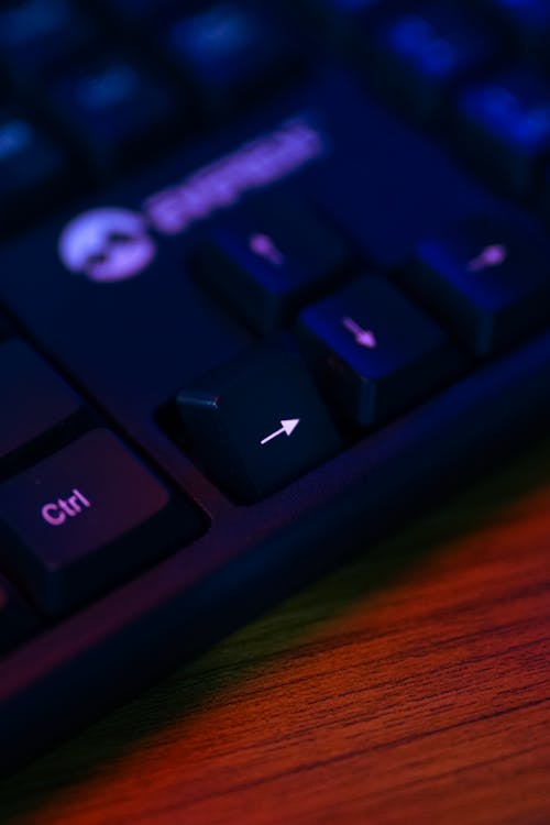 A Close-Up Shot of a Broken Key of a Keyboard