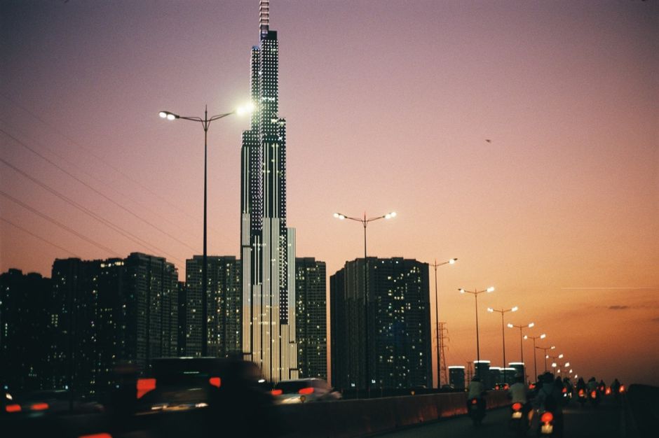 Dusk view of Landmark 81 in Ho Chi Minh City, showcasing a vibrant urban skyline.