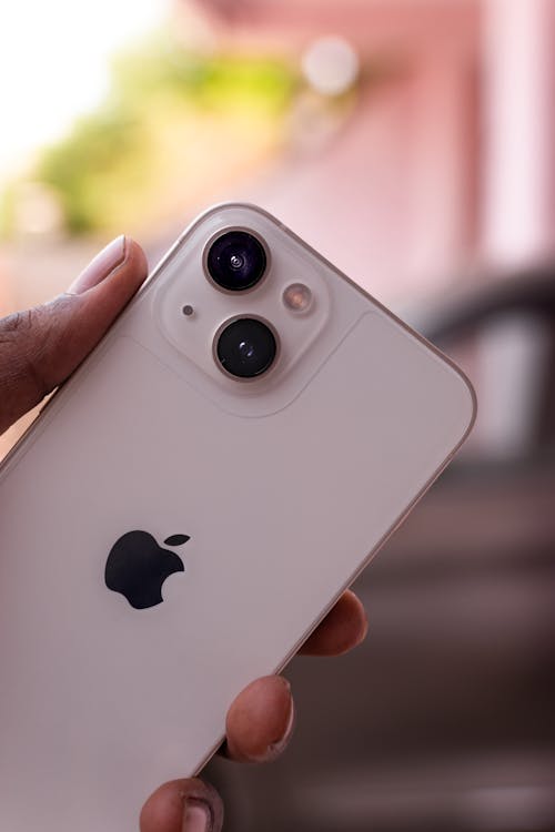 Close-up of a Man Holding an iPhone 