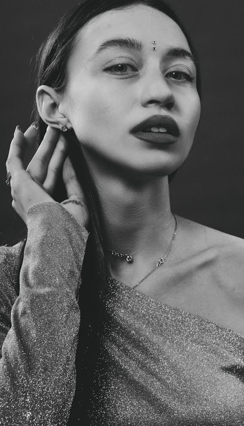Black and White Portrait of a Beautiful Woman with Face Piercing 