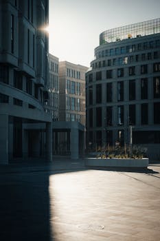 Sunlit modern buildings in downtown Minsk showcasing urban architectural elegance.