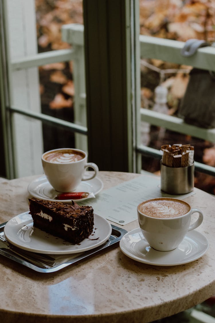 Coffee And Dessert On Table