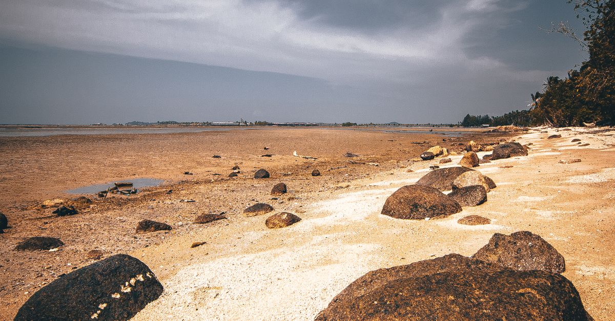 Photo Of Rocks On Seashore · Free Stock Photo