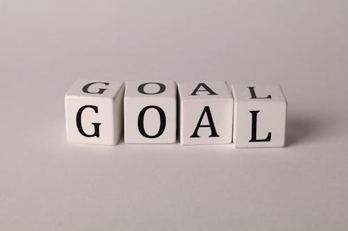 Photo of Cubes with Letters Forming the Word "Goal"