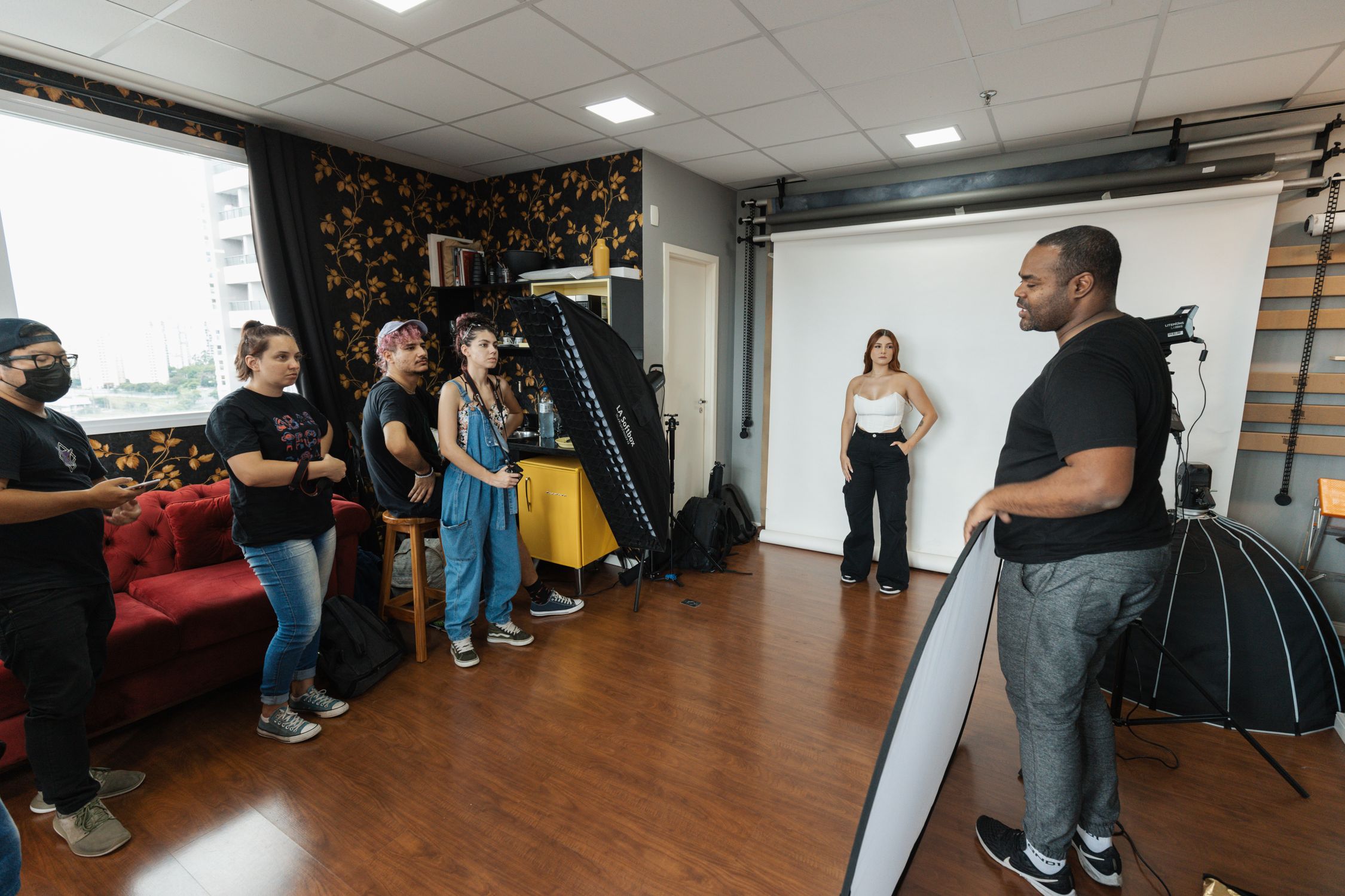 Getting Shoot Photo of a Group of People Getting Ready for a Photo Shoot in an ...