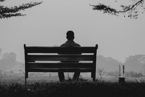 A Lonely Man Sitting on the Bench