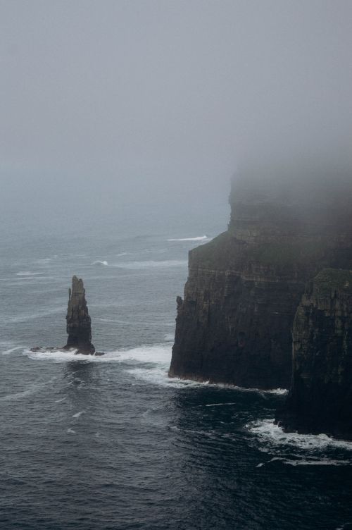 Sea stacks under low cloud, photo by Liudmyla Shalimova on Pexels