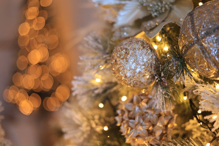 Close-Up Photo Of A Golden Christmas Ornament