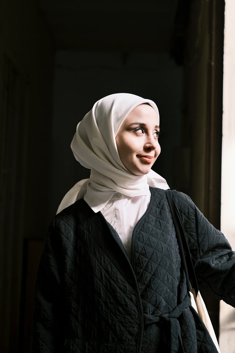 Sunlit Face Of Woman In Hijab