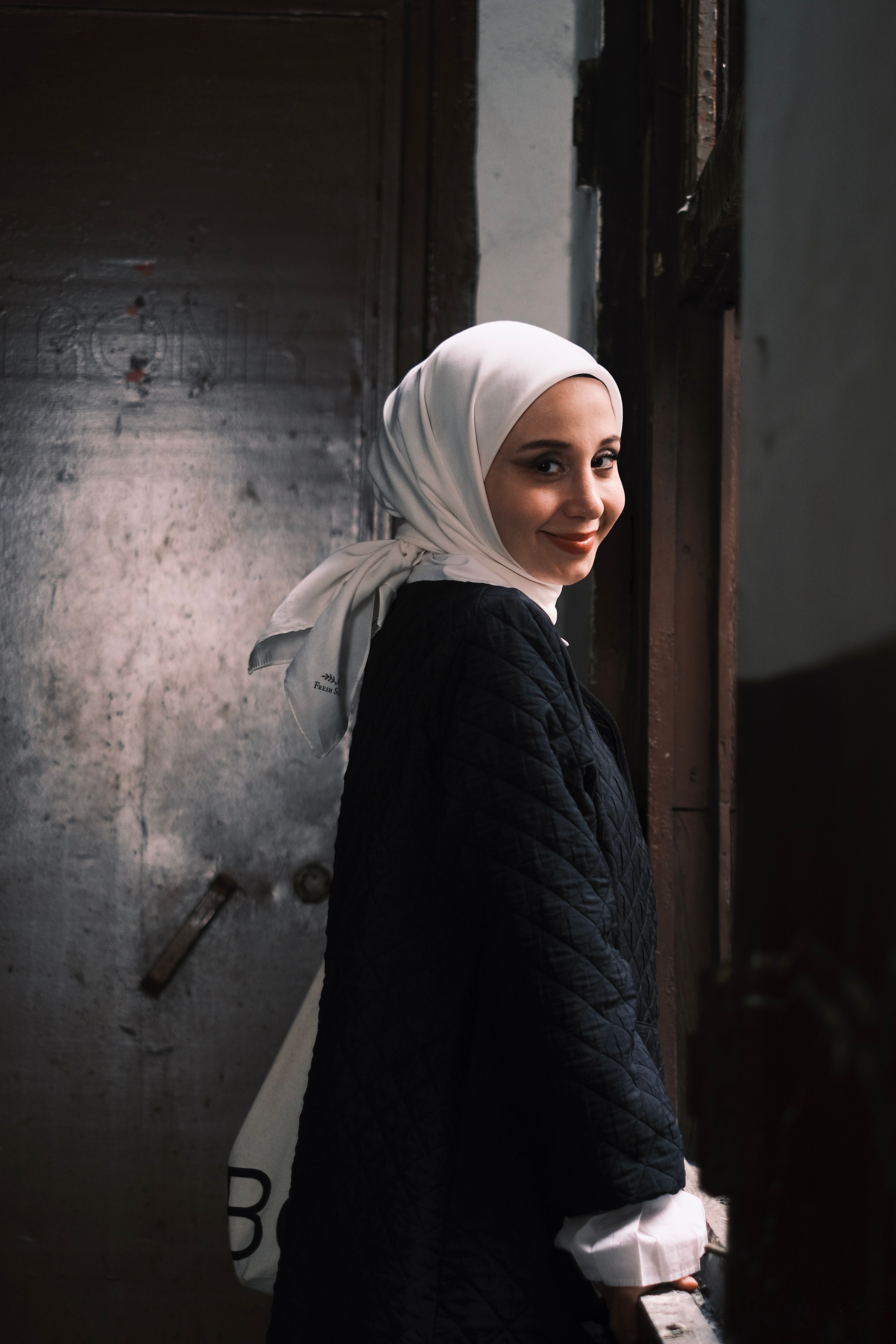 Young Woman in a White Hijab Smiling · Free Stock Photo