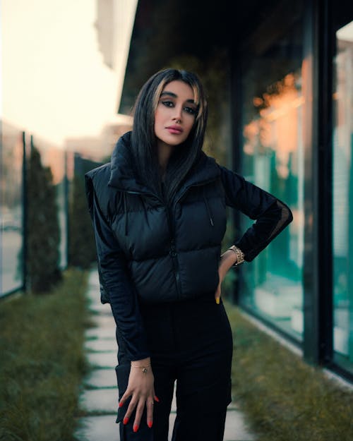 Woman Posing in Black Jacket