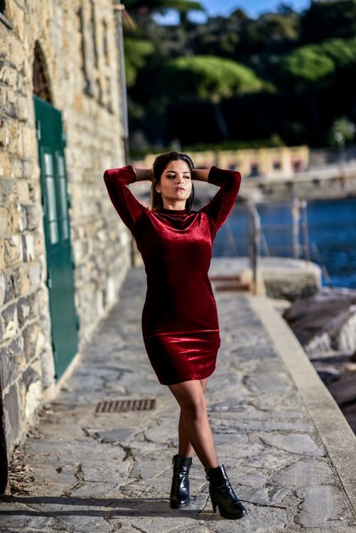 Woman in a Red Velvet Dress and Boots Posing Outdoors Free Stock Photo Woman in a Red Velvet Dress and Boots Posing Outdoors Free Stock Photo