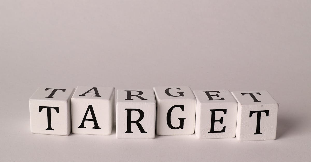White blocks spelling 'TARGET' on a neutral background with ample copy space.