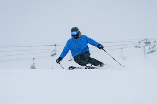 Free Man Skiing on a Slope  Stock Photo