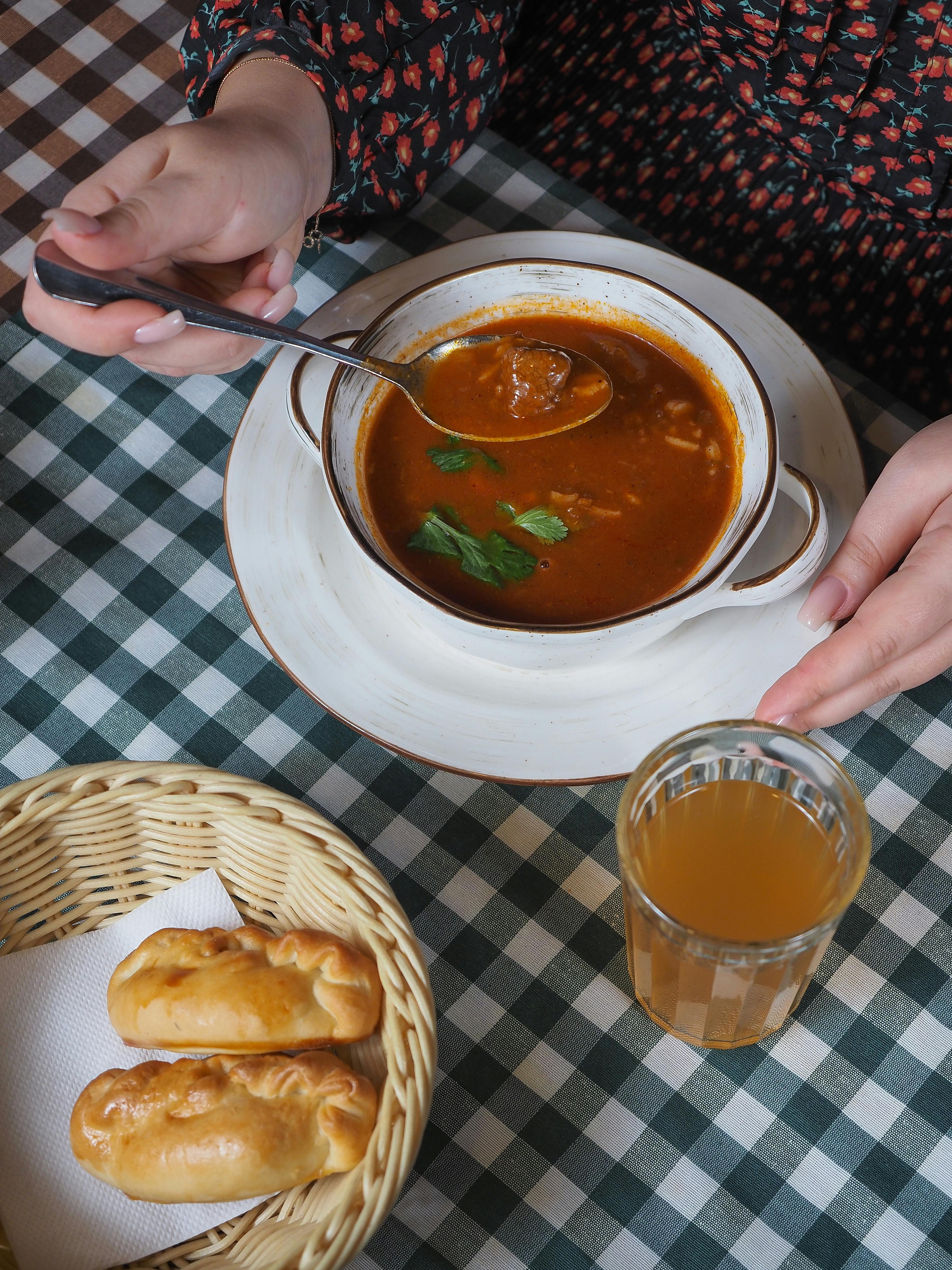 Free Woman Eating Soup Stock Photo