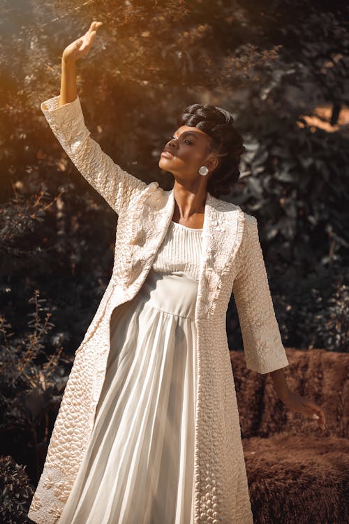 Woman in an Elegant Dress Posing Outdoors 