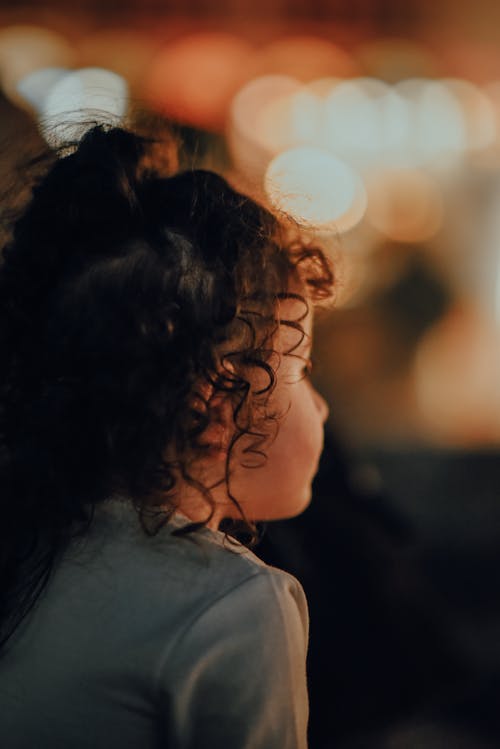 Side View of a Girl with Curly Hair