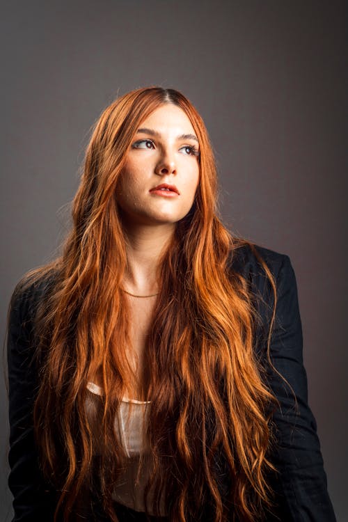 Portrait of a Young Woman with Long Red Hair 