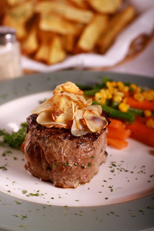 Roast Meat with Vegetables on a Plate 