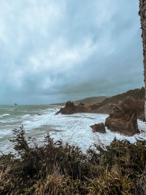 Clouds over Rocks on Sea Shore