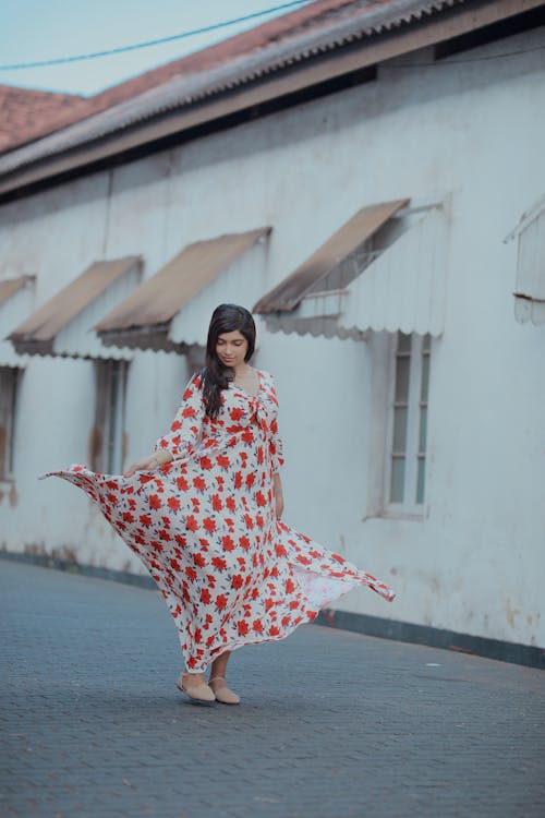 Woman Wearing a Long Floral Dress