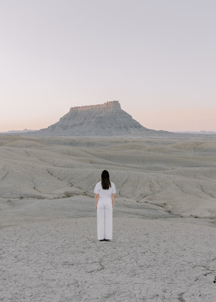 Woman On Desert At Dusk