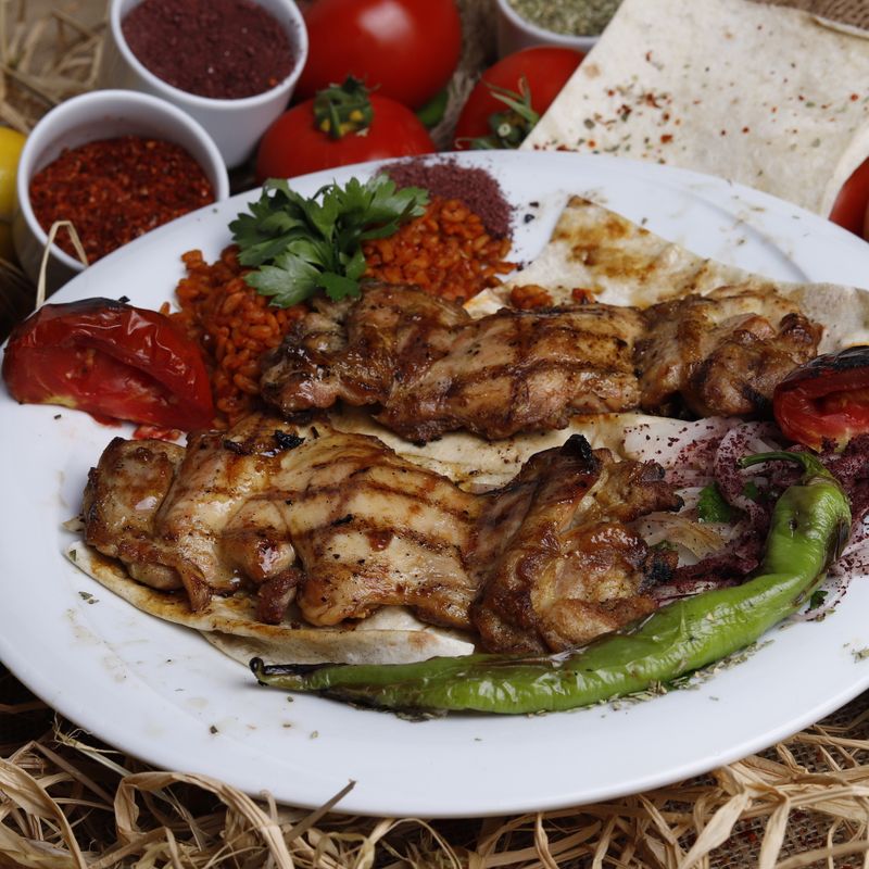 Sumac-Grilled Chicken Burgers with Pistachio Crunch