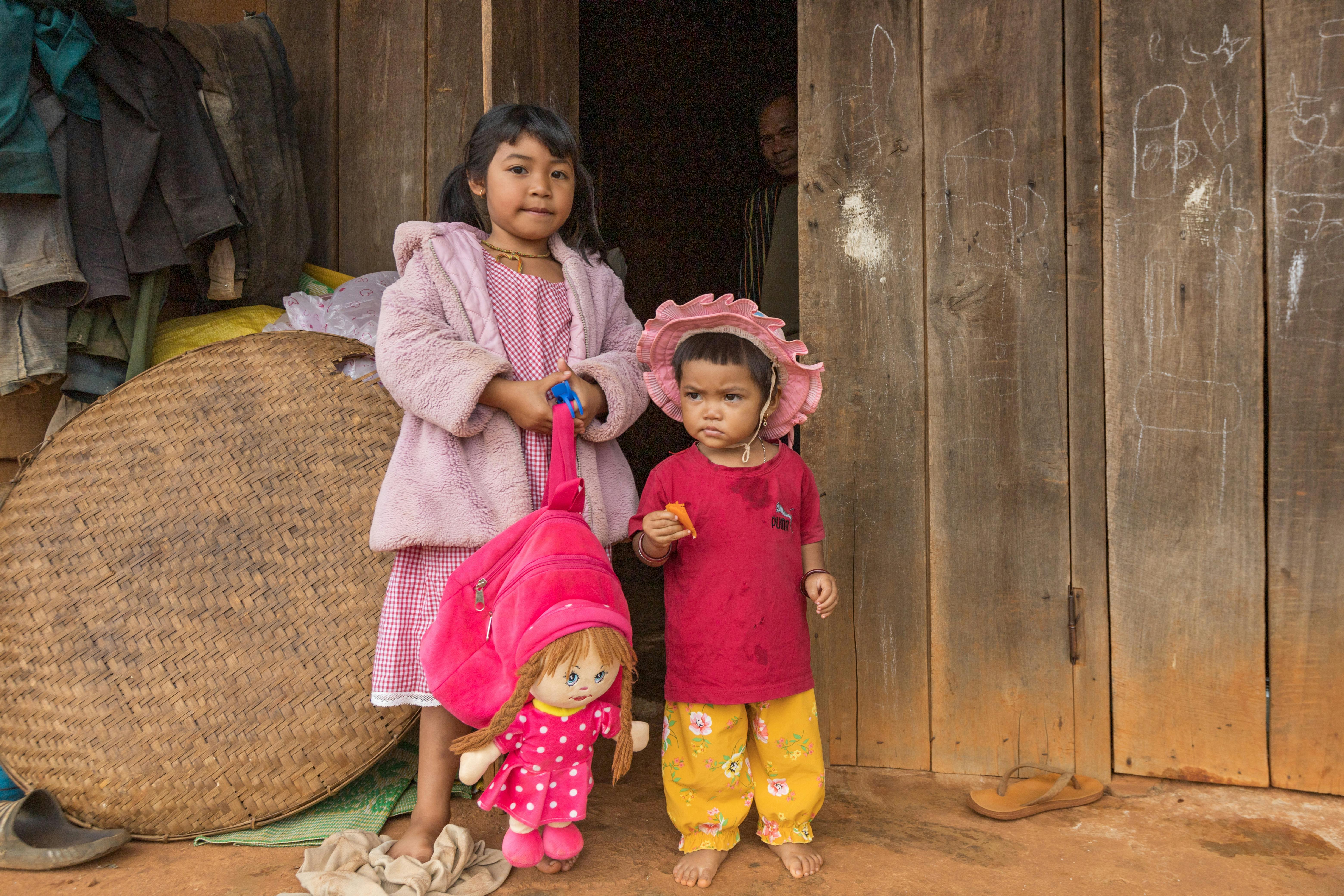 photograph of siblings standing together